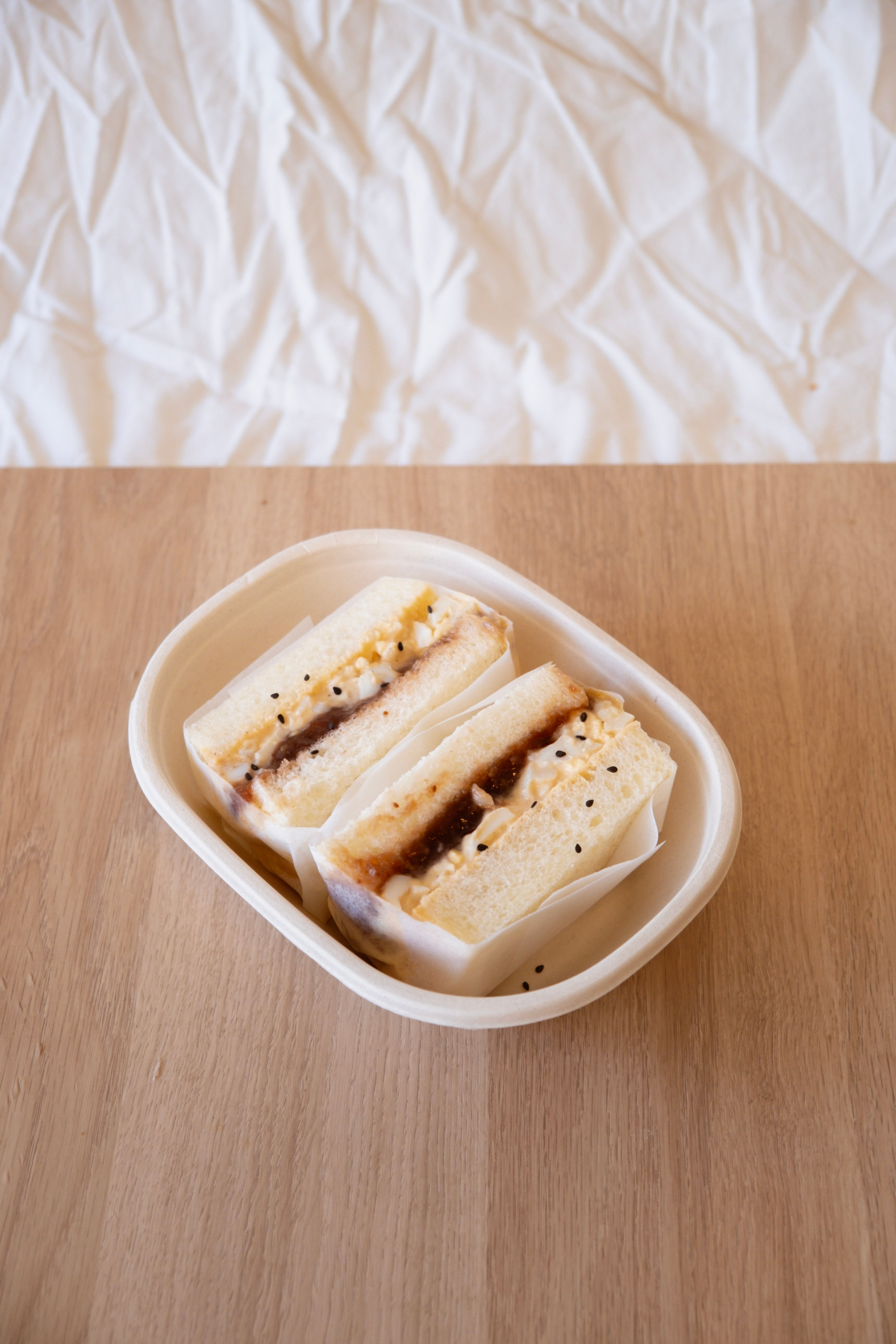 egg sando sandwich with strawberry jam